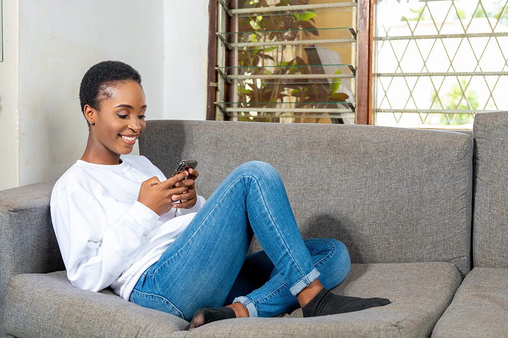 malawi teenager on sofa